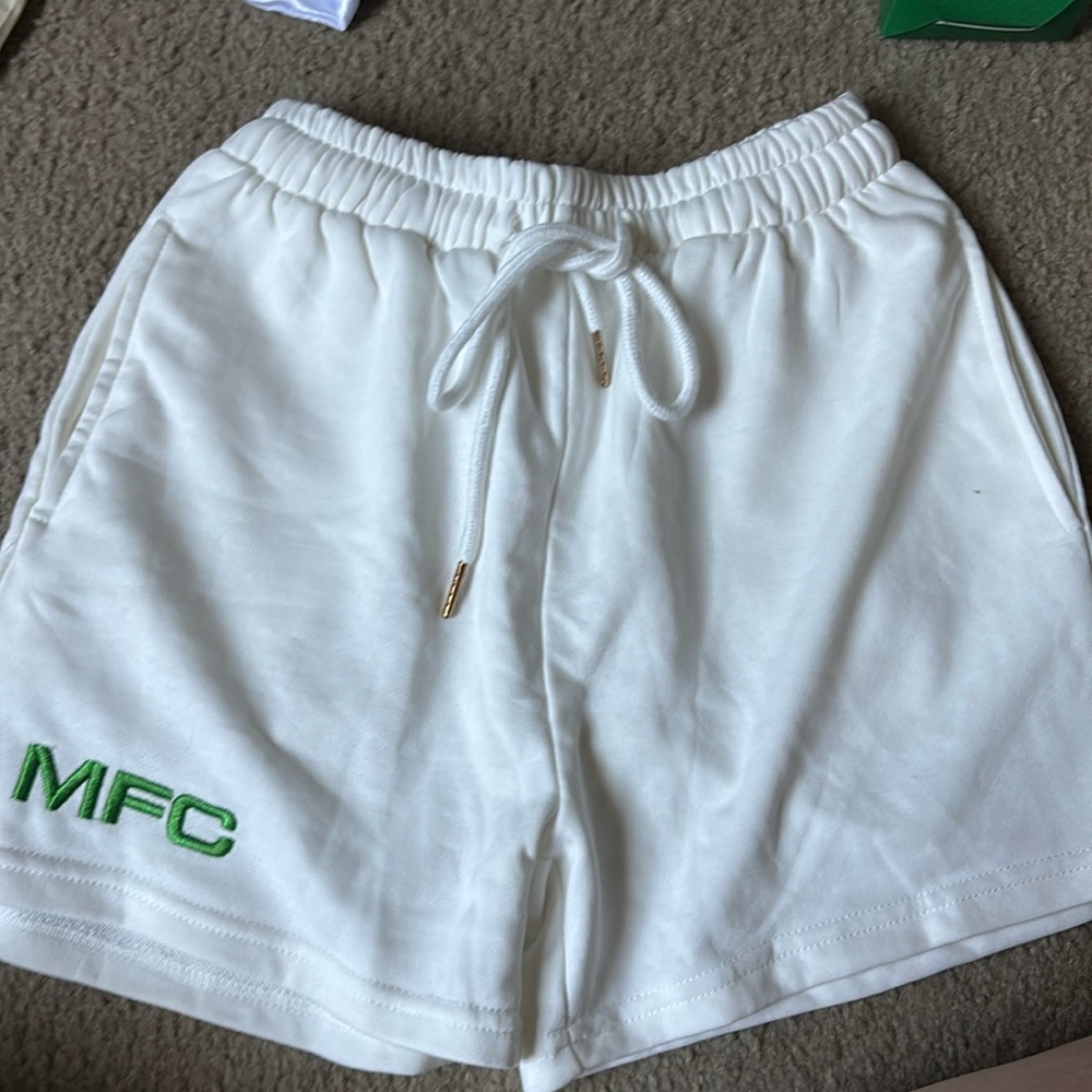 MFC green and white shorts